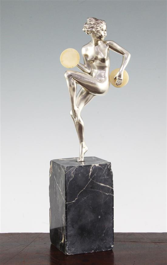 An Art Deco silvered bronze figure of a nude female dancer, overall 12.5in.